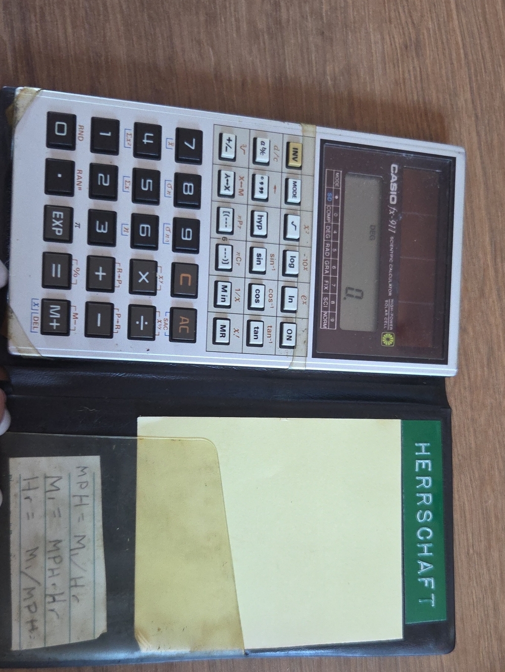 Casio scientific calculator in white and black